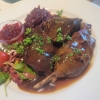 Graugansbraten an Graugansjus dazu Wirsing und Kartoffelrösti