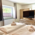 Foto zu Hotel Restaurant Auerhahn: Bett