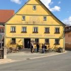 Foto zu Gasthaus Brennerei Sponsel: Eingang
