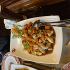 Foto zu Gourmet Tempel: Pikantes Kungpo HuhnCashenüsse & Gemüse 2025 14,80 €