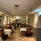 Foto zu Langerfelder Hof: Hinterer Gastraum nach dem großen Ansturm - Kellner unfreundlich - Wein nicht trinkbar