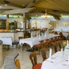Foto zu Zum Schlössle Finningen - Restaurant Hotel: Für 25 - 70 Personen. Der offene Kamin gibt dieser charismatischen Stube Ihren Namen