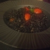 Schwarzes Risotto mit Tintenfisch