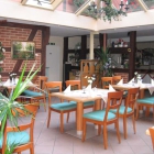 Foto zu Gundelfinger's Gasthaus - Hotel Alter Markt: Wintergarten