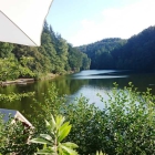 Foto zu Seehaus Forelle: Blick von der Terrasse auf den Eiswoog