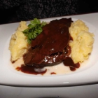 Foto zu Brasserie Atlas: Ochsenbacke mit Portweinsauce, Rahmkohlrabi und Kartoffelpüree  17,90 €