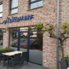 Foto zu Mediterrano: Terrasse zur Straße