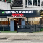 Foto zu Palm Palace Restaurant: Außenansicht bei Tag.