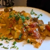 Vorzügliche Pappardelle mit Rind in Tomatensahne