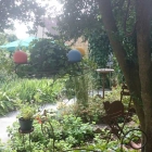 Foto zu Das kleine Gartencafé: Am Garteneingang